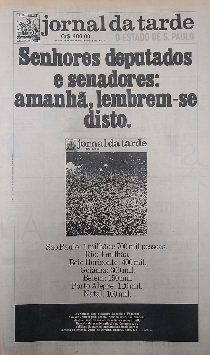 Na véspera da votação da emenda Dante de Oliveira, um lembrete do Jornal da Tarde para os parlamentares, com foto da grande manifestação do Anhangabaú